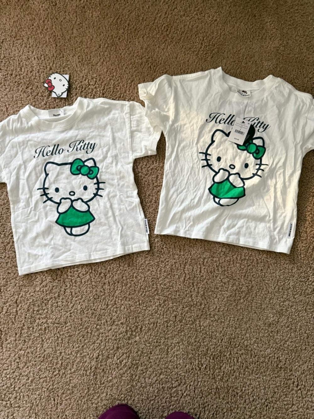 Hello Kitty White T-shirt with Green Bow and Dress - Hello Kitty $30 for two.